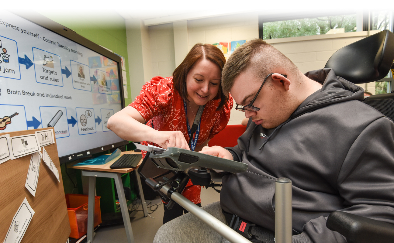 Foundation Studies student and tutor taking part in a classroom activity