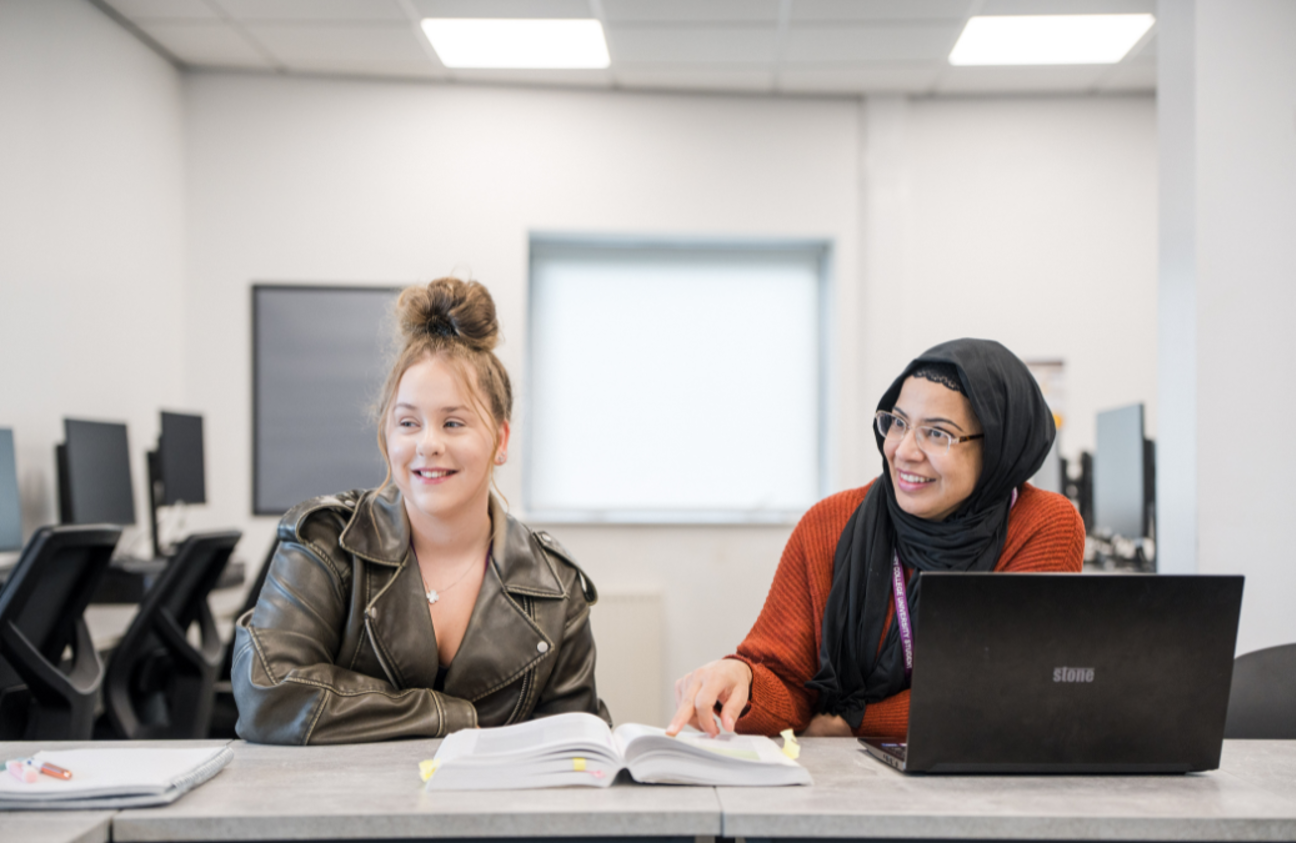University Centre students smiling in class