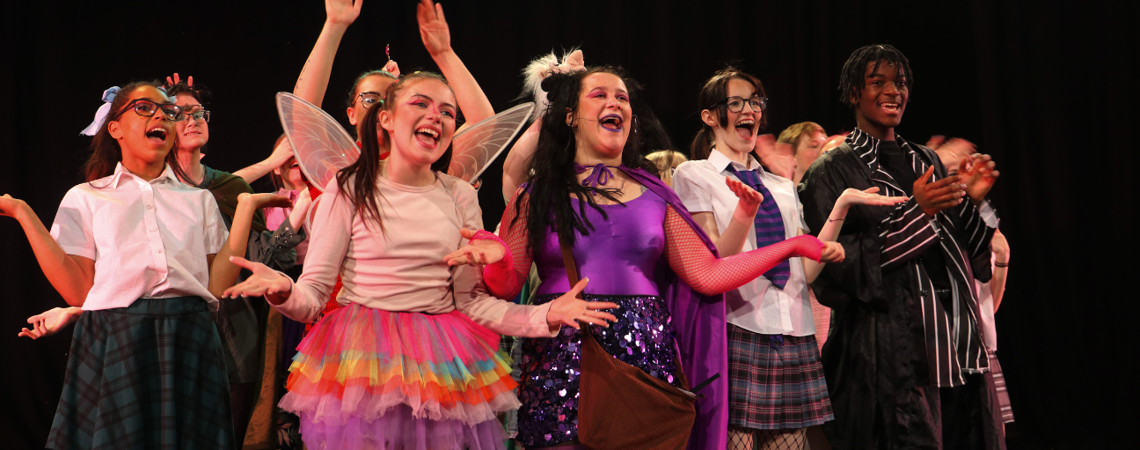 a group of performing arts students in the panto