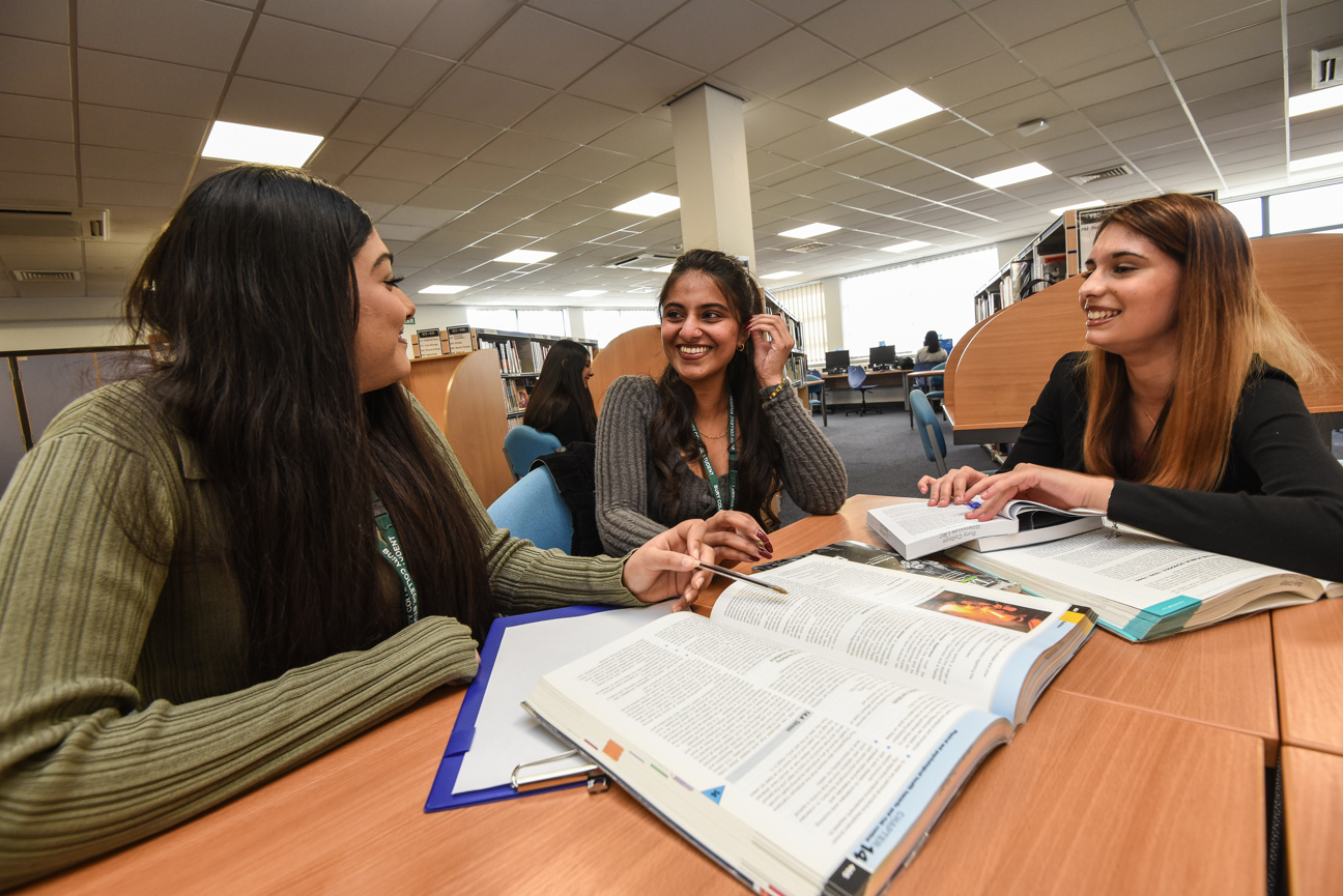 students sat in the learning resource centre together