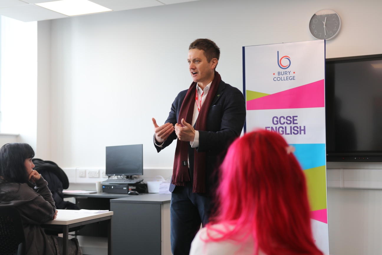 MP James Frith stood giving a talk at Bury College