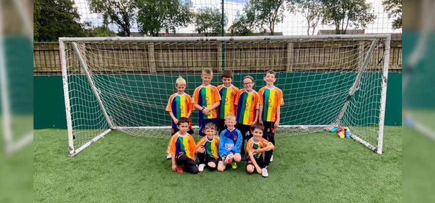 Westbury Sports Club Under 9s wearing their Bury College sponsored kits