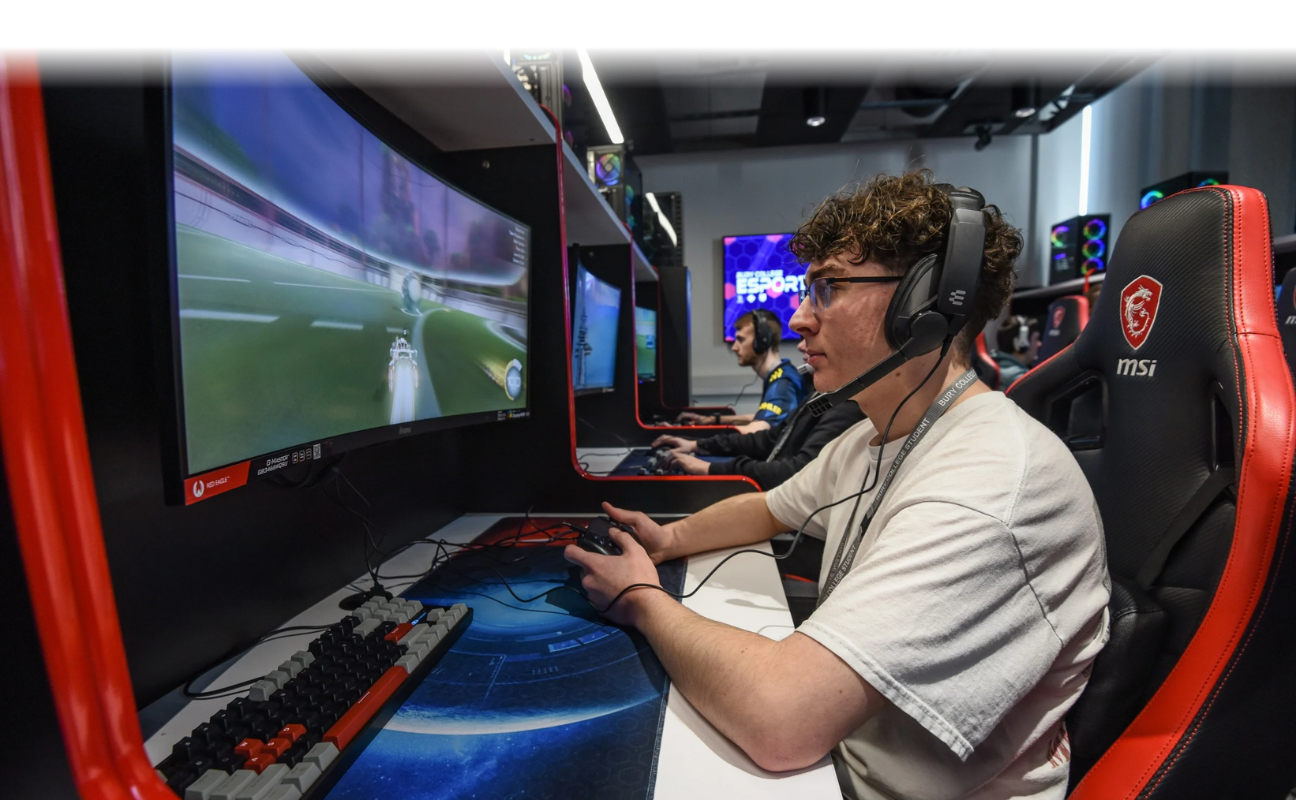 esports students sat gaming in the esports suite