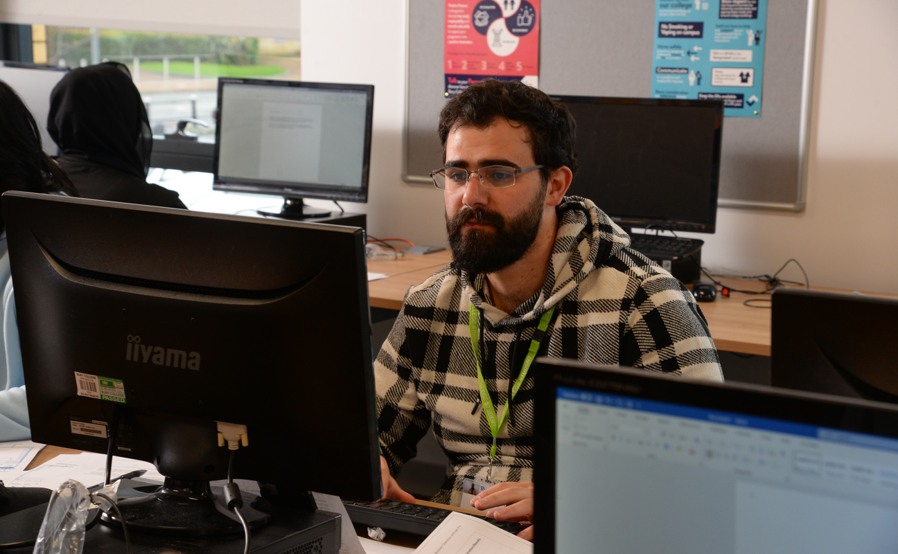 adult learner using a computer 