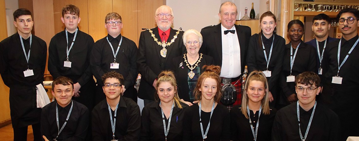 Group of Bury College Catering students stood with the Mayor of Bury