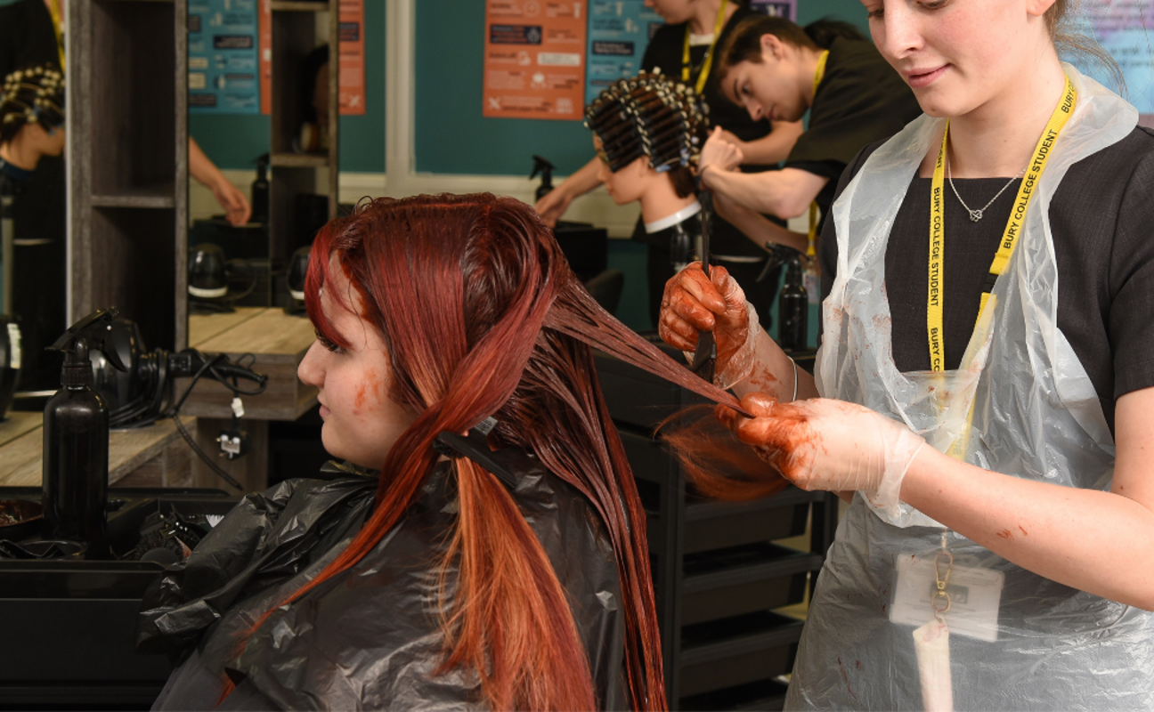 student colouring someone's hair