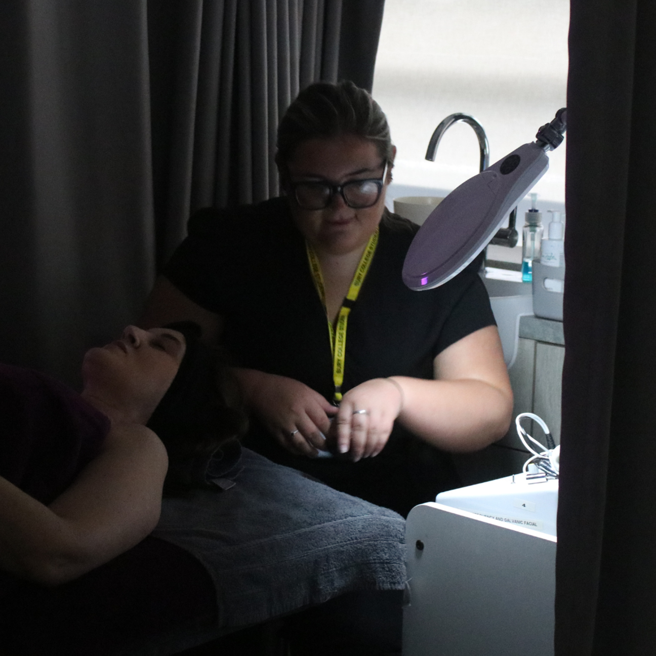 Students providing treatments at Bury College's hair and beauty employer event
