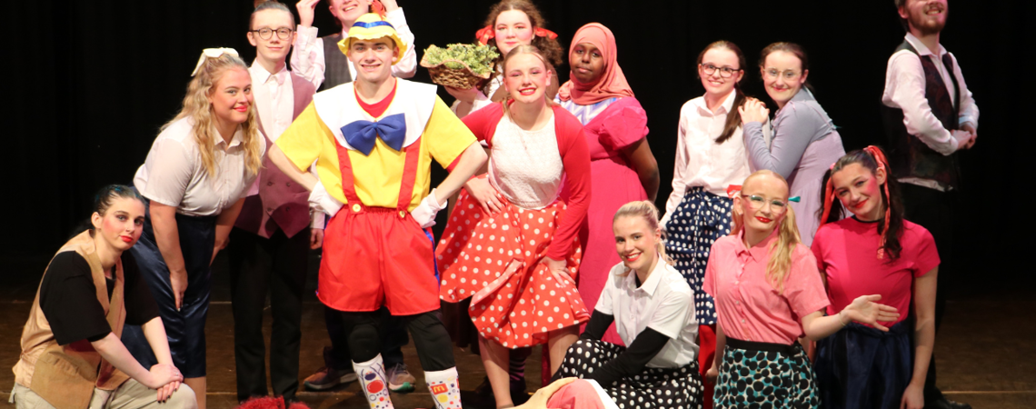 group of students in pantomime costumes