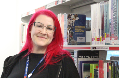 Bury College adult learner, Stacy, in the library