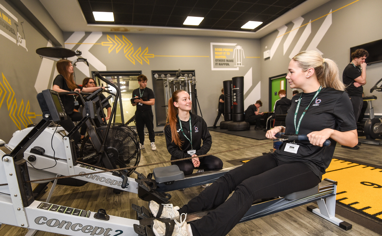 Sport students taking part in a practical activity in the fitness gym