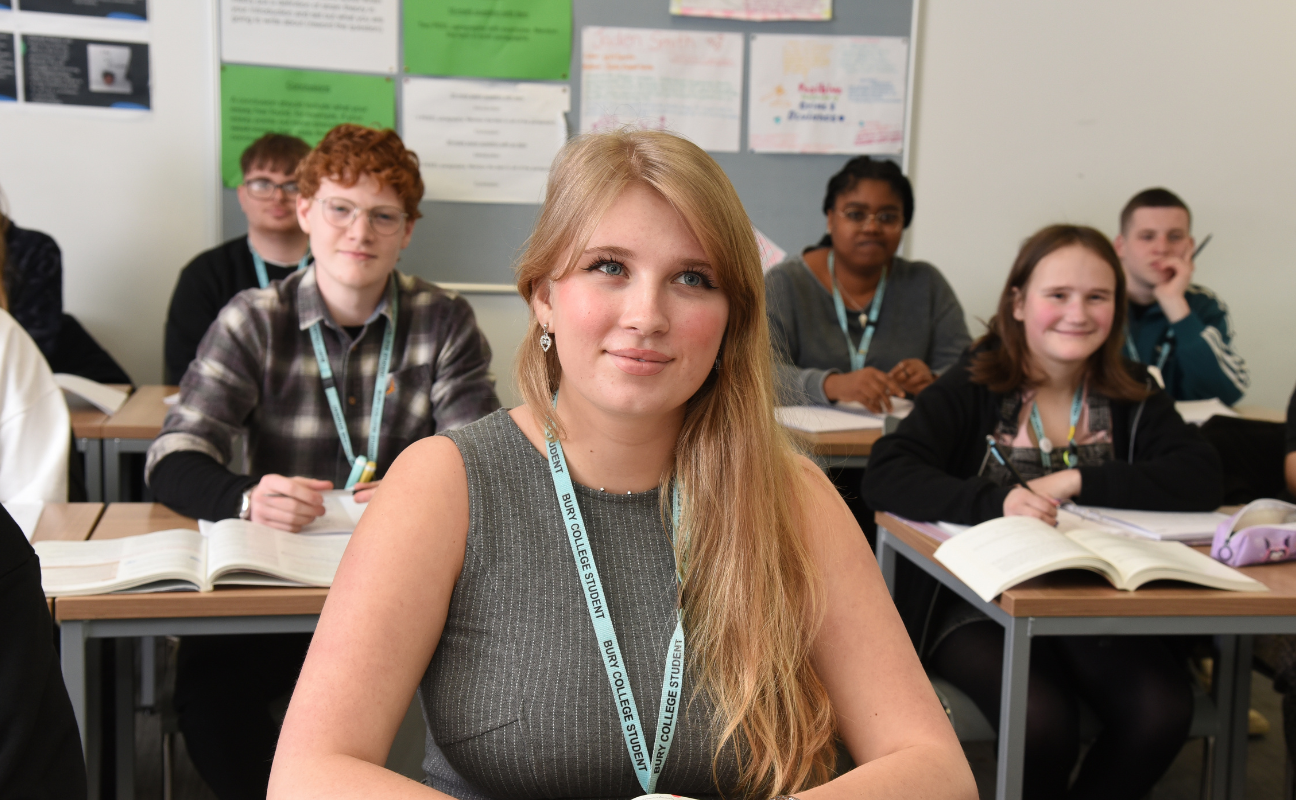 students sat in a classroom learning
