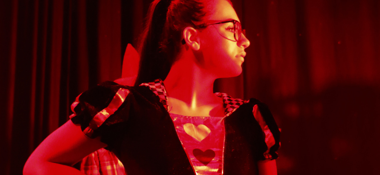 performing arts student playing queen of hearts