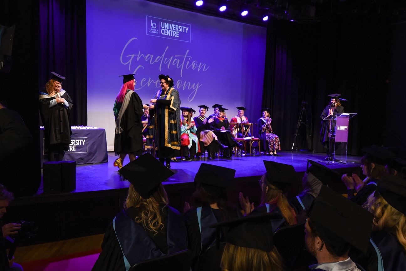 Stacy on stage at the Bury College University Centre Graduation
