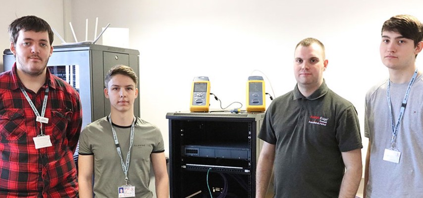 Students stood in-front of a server stack