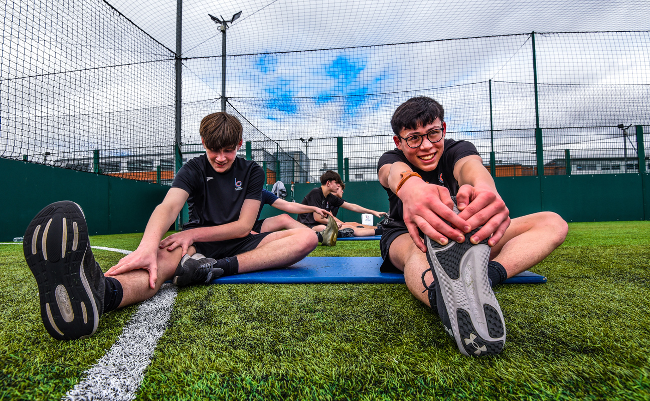 Sport students taking part in a practical activity outside on the Powerleague Astro football pitches