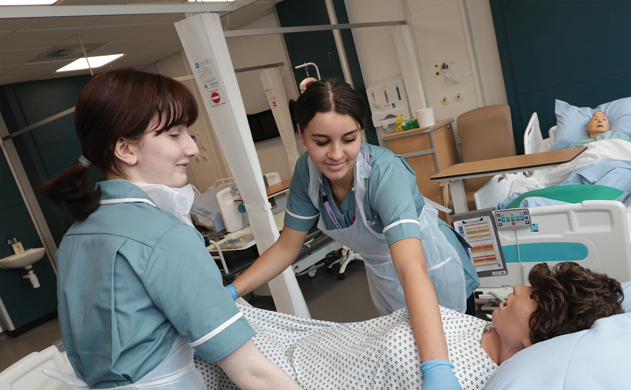 students looking after patient 