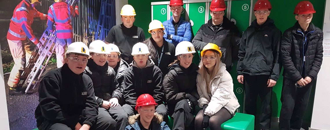 A group of Bury College Public Services students sat in the GM Fire and Rescue Service Training and Safety Centre